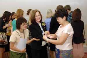 The special 'good luck' thread being tied to my wrist by 'Big Thai Mama', who runs the projects.. And, as is traditional when having the thread tied, my arm is being supported by the wonderfully kind and helpful Duangsamorn.